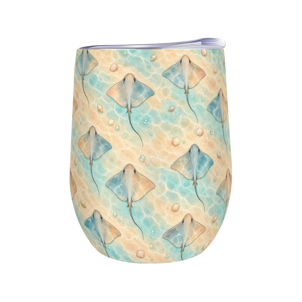 White stemless wine tumbler printed with a repeating pattern of stingrays