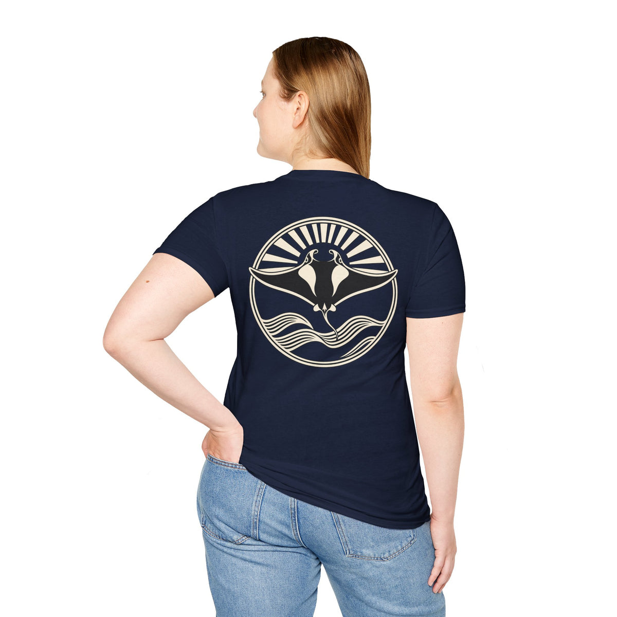Woman seen from behind wearing a navy t-shirt with a large manta ray sunrise badge on the back, digital mockup