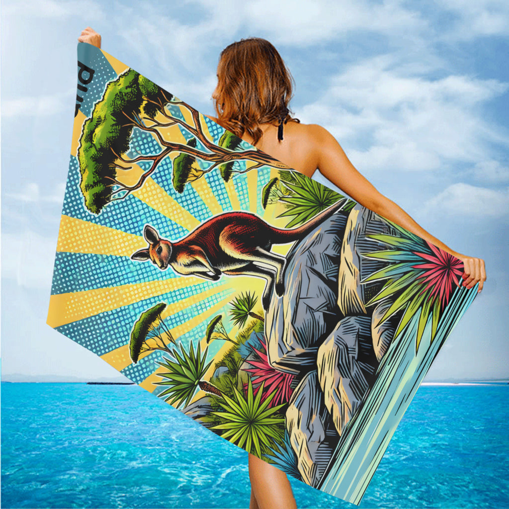 Kangaroo beach towel held up on the beach in the wind
