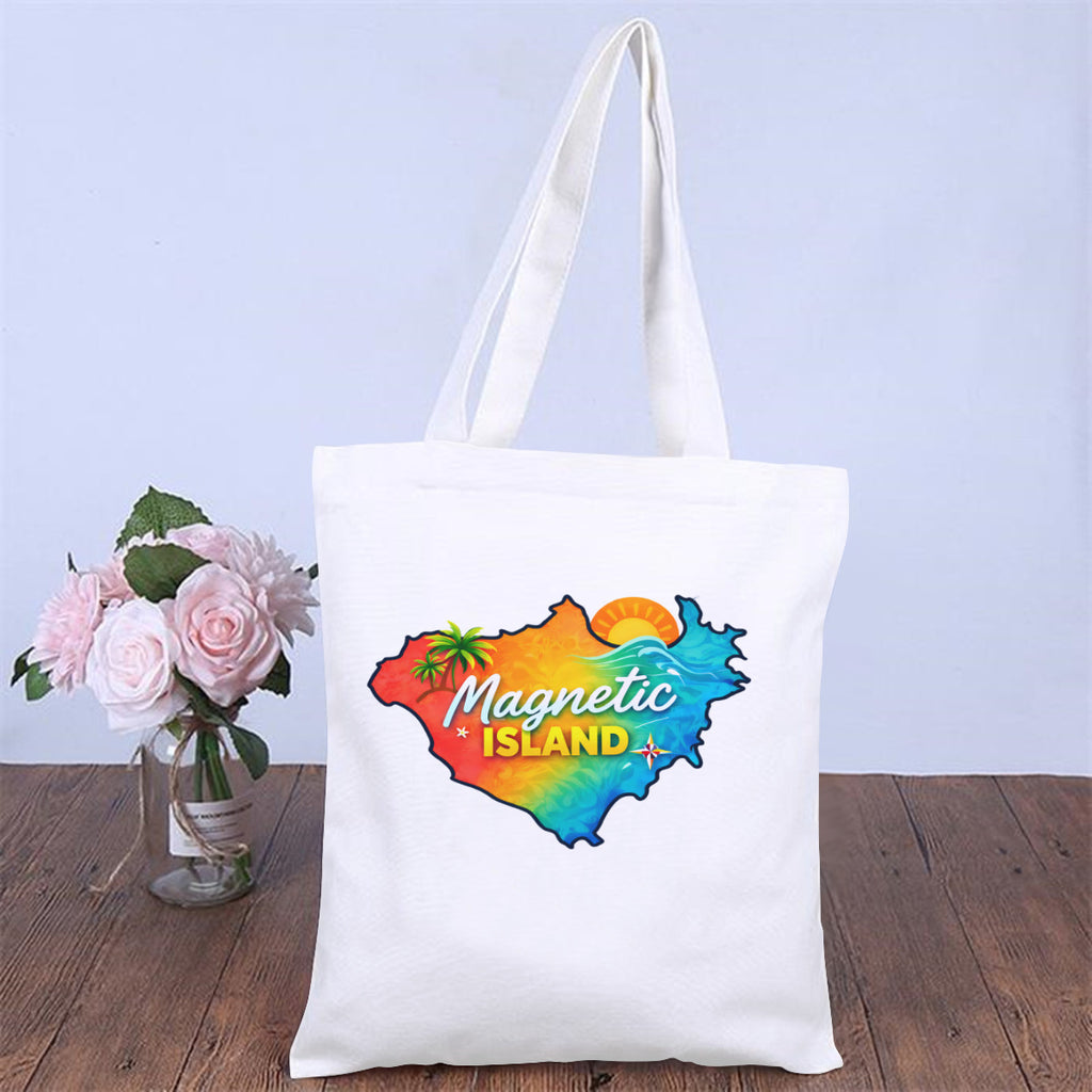 Magnetic Island map tote bag styled on a table with flowers