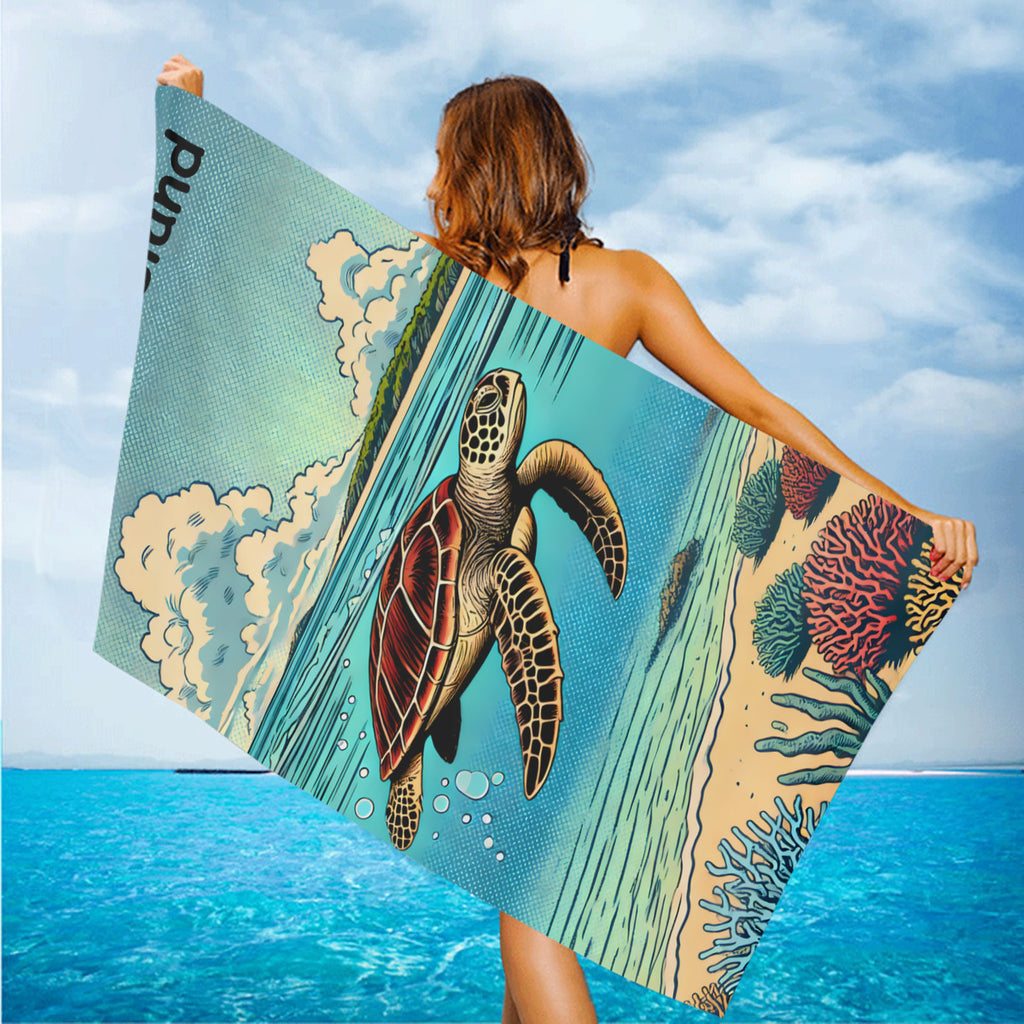 Turtle beach towel held up on the beach in the wind