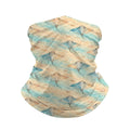 Neck gaiter and diving headband with blue stingrays on diagonal bands of peach, sand and teal