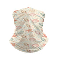 Neck gaiter and diving headband with coral red starfish, scallops and conch shells on a cream and beige background