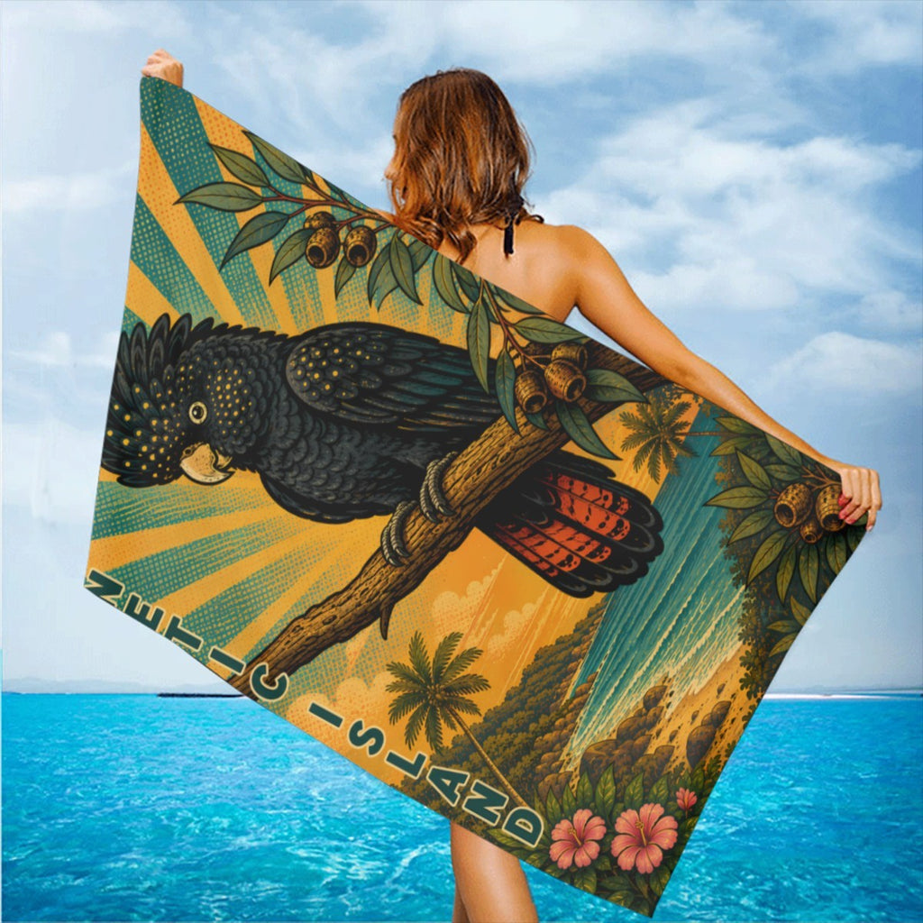 Cockatoo beach towel held up on the beach in the wind
