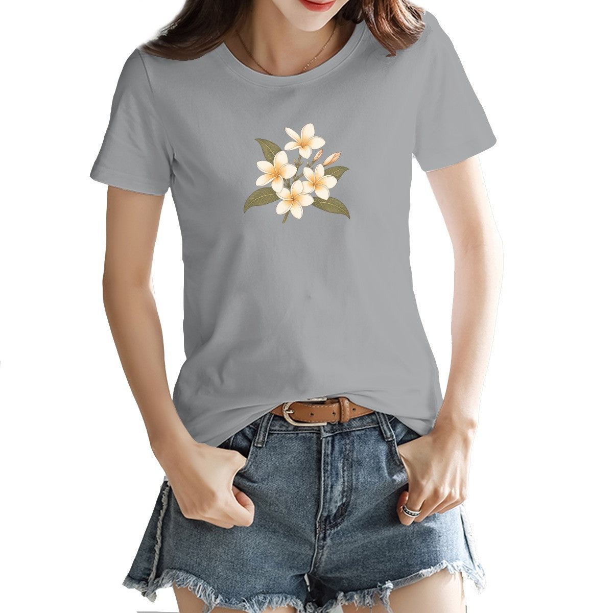 Frangipani flower print on a women's t-shirt, cream and gold blooms