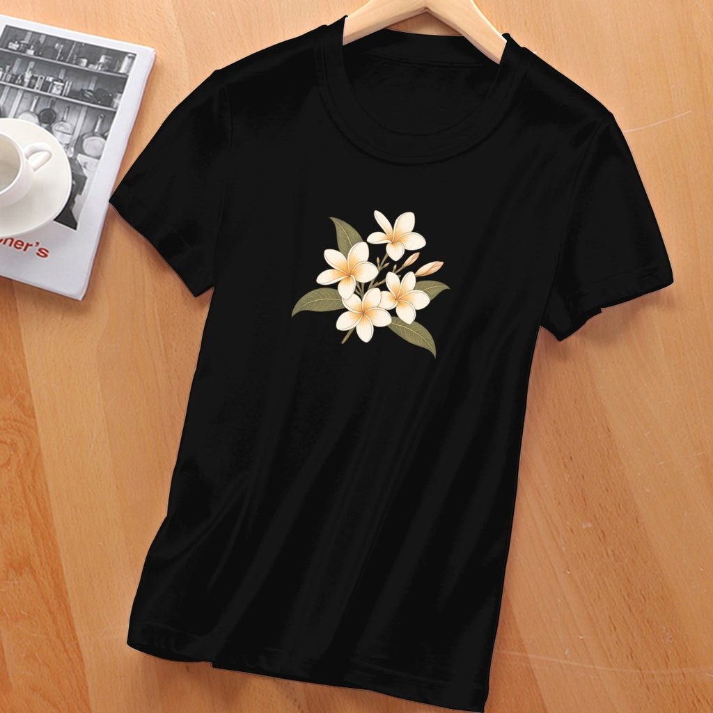 Frangipani flower print on a women's t-shirt, cream and gold blooms