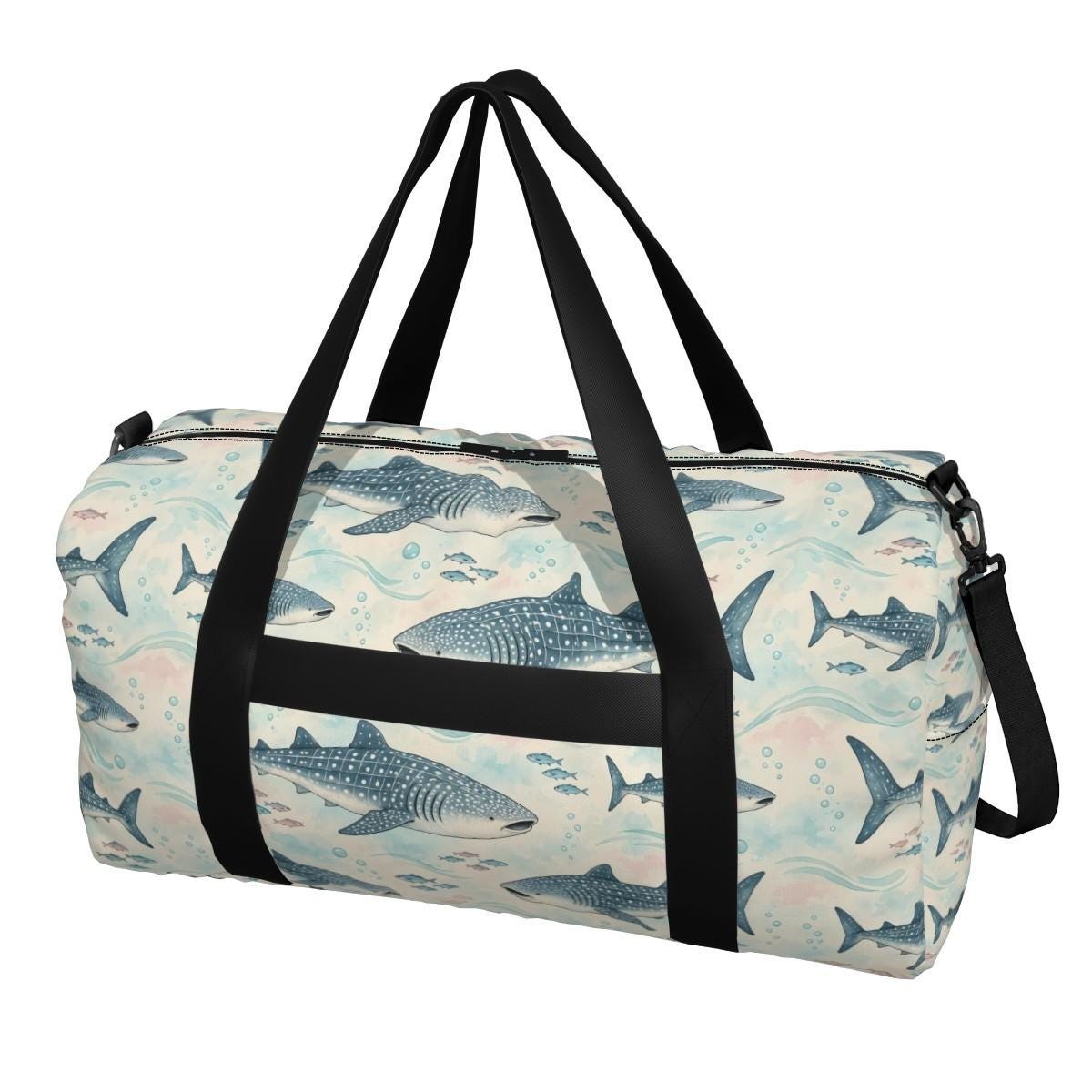 Front of the whale shark duffle bag showing spotted whale sharks and small fish, with black carry handles