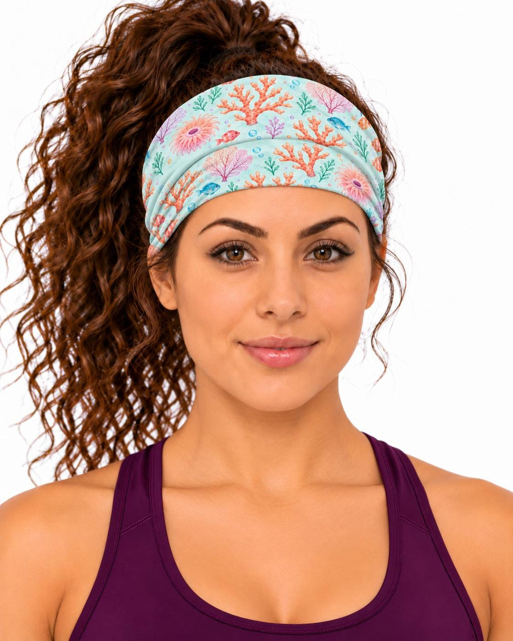 AI generated model wearing the pastel coral reef neck gaiter as a headband, front view