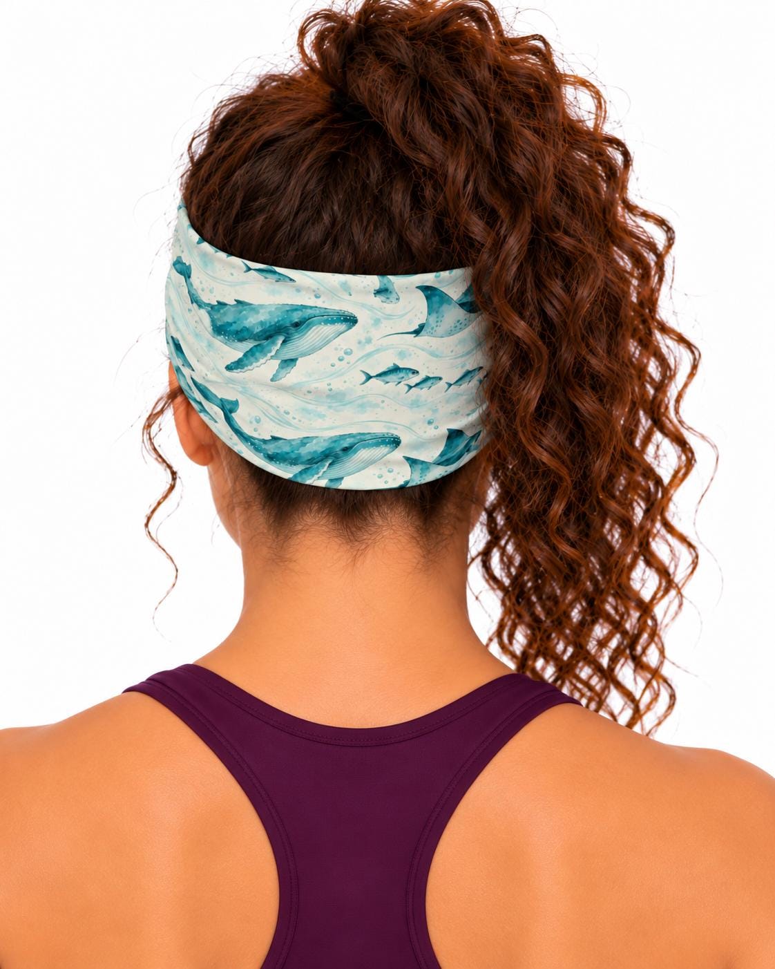 AI generated model wearing the whales and manta rays neck gaiter as a headband, back view